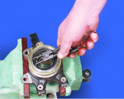 3. If the outer part of the inner bearing ring remains on the hub, press it off with a puller.…