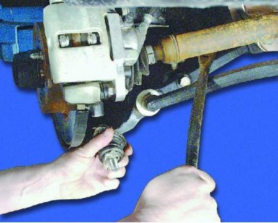 5. Remove the two bolts securing the ball joint to the steering knuckle.
