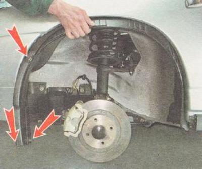 Note: The mudguard liner mounting screws are screwed into spring clips. Do not lose them when…