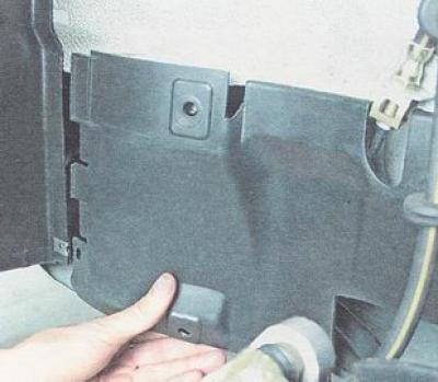 4. Disengage the shield from the front fender liner and remove the shield.