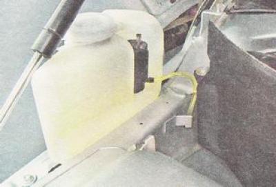 11. Remove the windshield washer reservoir and, having disconnected the tubes from its electric…