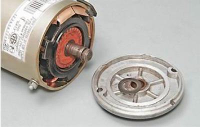 19. Remove the back cover and spacer washer.