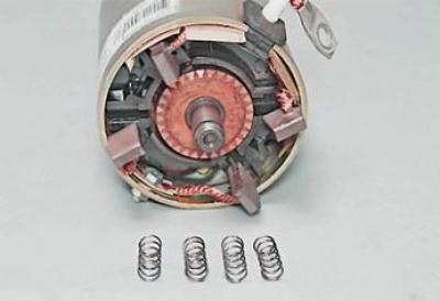 22. Using a thin slotted screwdriver, pry up...