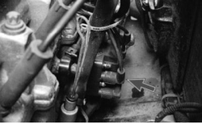2. Disconnect the wiring harness connector from the ignition module low voltage circuit connector,