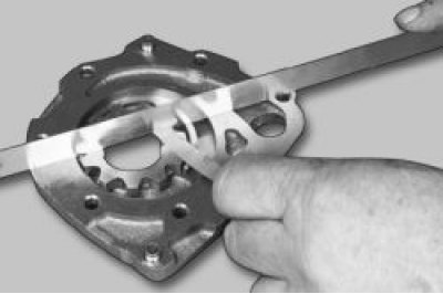 16. Measure the axial clearance of the driven gear in the same way. The maximum permissible axial…