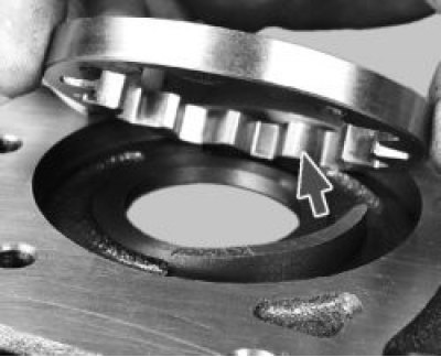 23. Install the drive gear into the pump housing. The chamfers on the gear teeth should face the…
