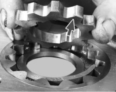 24. Install the cover on the body and screw in the bolts that secure it.