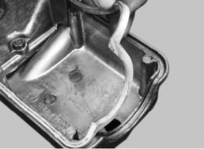 Установите крышку на головку блока.