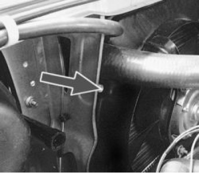 4. Unscrew the two mounting nuts and remove the bracket.