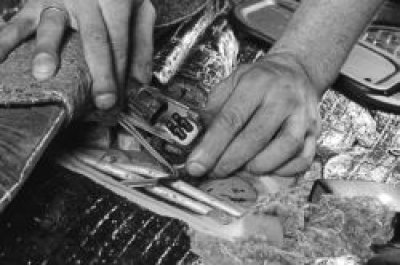 7. Unscrew the fuel supply pipe nut and move the pipe to the side.