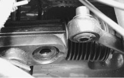 11. Clamp the steering rod in a vice by the hexagon on the coupling sleeve. Loosen the lock nut…