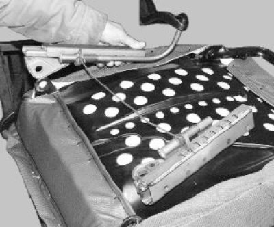 11. Install the skids and seat in the reverse order of removal.