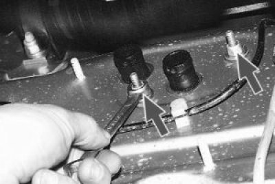 7. Remove the heater tap from the front shield.