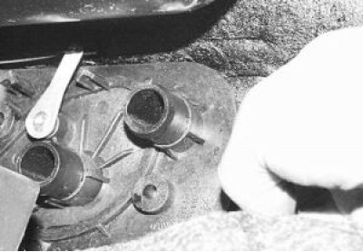 8. Remove the heater tap rod holder.