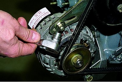 Remove the coolant pump drive belt (see Adjusting the tension and replacing the coolant pump drive…