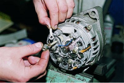 Using a 10 mm spanner, unscrew the nut…
