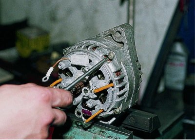 Remove the washer from the rotor shaft.