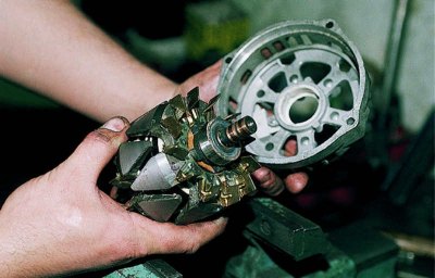 With a punch that rests strictly against the end of the rotor shaft (to avoid damaging the plastic…