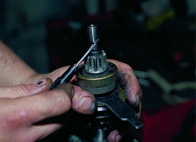 ...and, hitting the key with a hammer, we press the limiting ring.